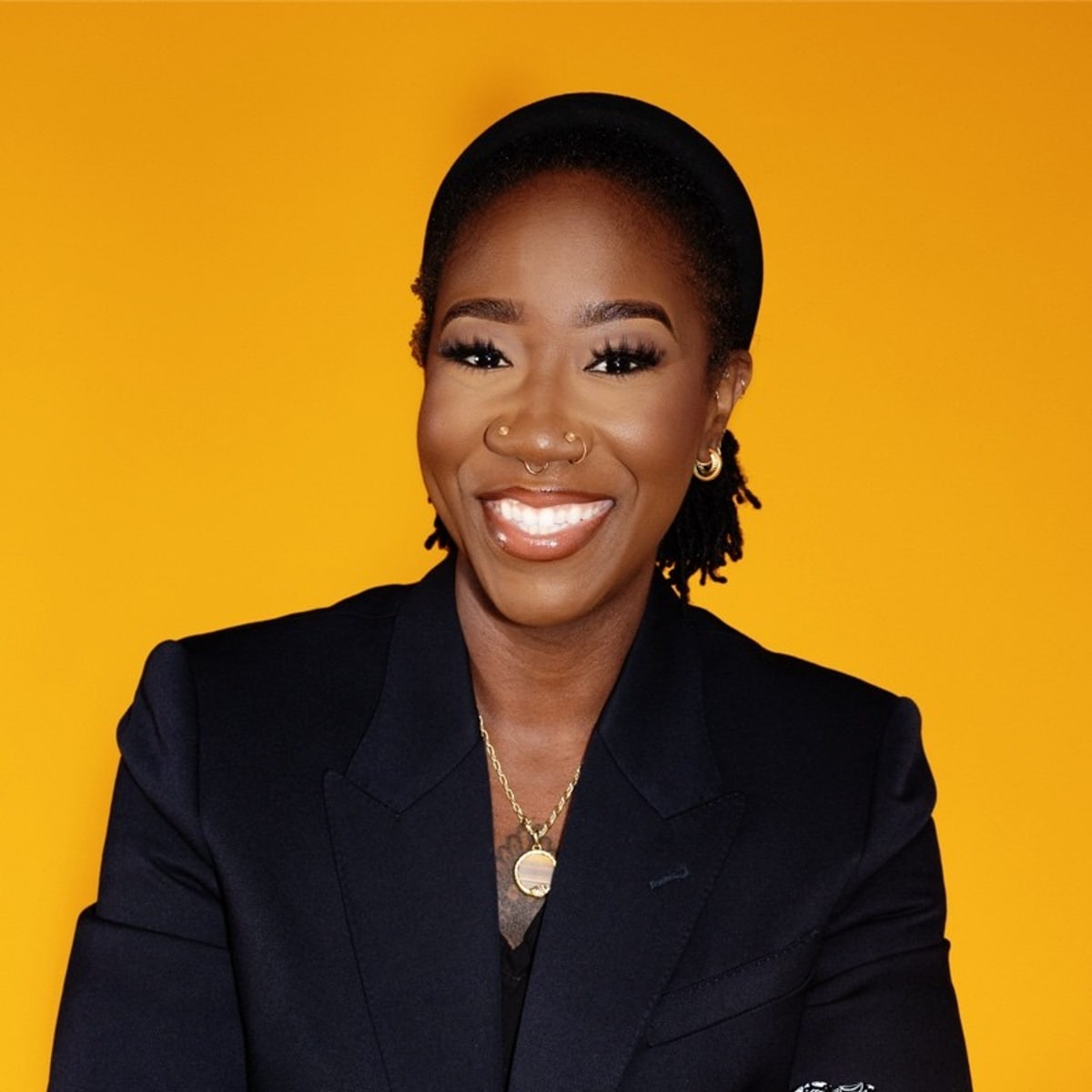 Head-and-shoulders portrait of Ash Coleman Hynie